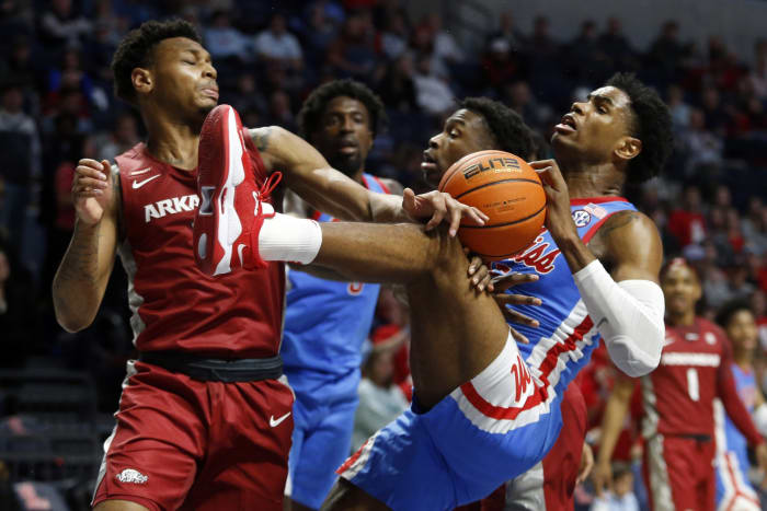 NCAA Basketball: Arkansas at MississippiArkansas Razorbacks guard Au Diese Toney (5) and Mississippi Rebels guard-forward Luis Rodriguez (15) battle for a rebound during the second half at The Sandy and John Black Pavilion at Ole Miss.